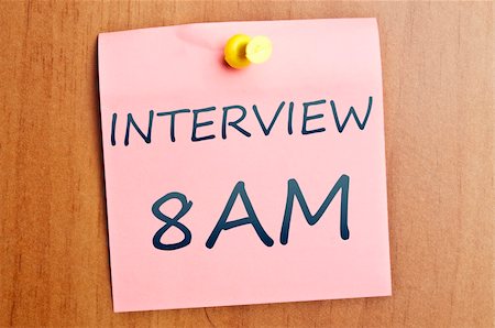 simsearch:400-04835143,k - Interview reminder post it on wooden wall Stock Photo - Budget Royalty-Free & Subscription, Code: 400-04332891