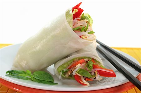Lucky roll with lettuce, salmon, rice noodles, bell peppers and Thai basil Stock Photo - Budget Royalty-Free & Subscription, Code: 400-04333255