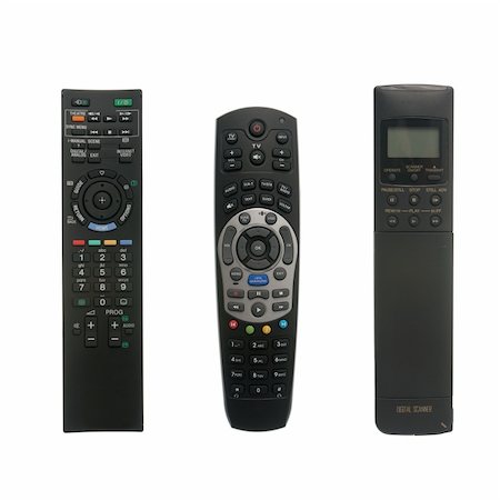 Three remote control devices isolated on white background. Foto de stock - Super Valor sin royalties y Suscripción, Código: 400-04333846