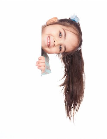 simsearch:400-04364119,k - Smiling little girl holding empty white board Fotografie stock - Microstock e Abbonamento, Codice: 400-04333988