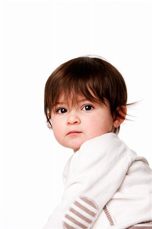 simsearch:400-04344209,k - Face of a cute adorable baby infant toddler with innocent surprised expression looking over shoulder, isolated. Foto de stock - Super Valor sin royalties y Suscripción, Código: 400-04344209