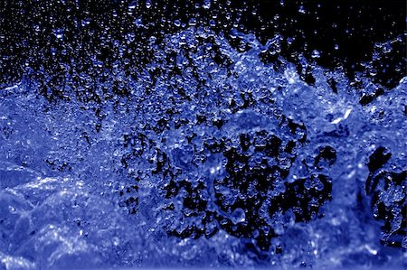 Frozen water splash with a blue color touch Stock Photo - Budget Royalty-Free & Subscription, Code: 400-04344573