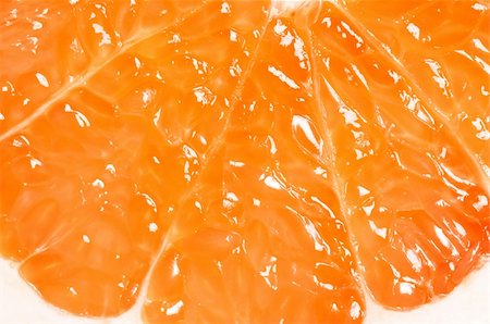 simsearch:400-05316300,k - Close up half of ripe grapefruit. Food background. Stock Photo - Budget Royalty-Free & Subscription, Code: 400-04344786