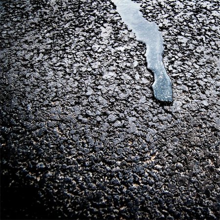 pollution on road - rain drop on black pavement Stock Photo - Budget Royalty-Free & Subscription, Code: 400-04345039