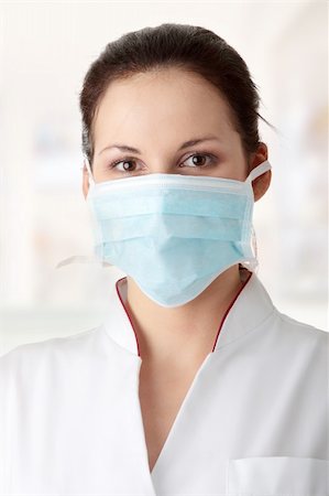 simsearch:400-04629961,k - Young nurse in mask Stockbilder - Microstock & Abonnement, Bildnummer: 400-04345482