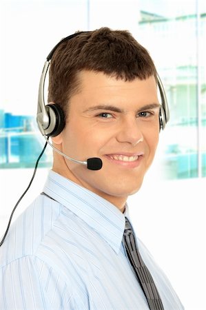 simsearch:400-06108986,k - Charming customer service representative with headset on Stock Photo - Budget Royalty-Free & Subscription, Code: 400-04345504