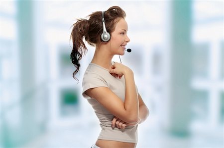 simsearch:400-03985399,k - Beautiful Call Center Woman Wearing A Telephone Headset, isolated on white background Foto de stock - Royalty-Free Super Valor e Assinatura, Número: 400-04345864