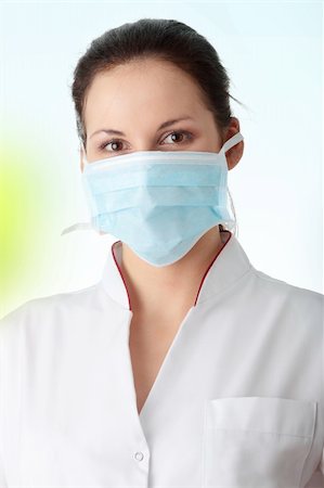 simsearch:400-04626468,k - Young nurse or doctor in mask Stockbilder - Microstock & Abonnement, Bildnummer: 400-04345879