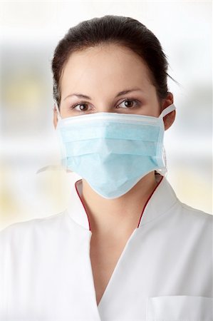 simsearch:400-04129952,k - Young nurse in mask Stockbilder - Microstock & Abonnement, Bildnummer: 400-04346297