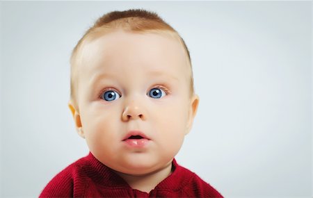 portrait of little boy looking at camera Stock Photo - Budget Royalty-Free & Subscription, Code: 400-04346353