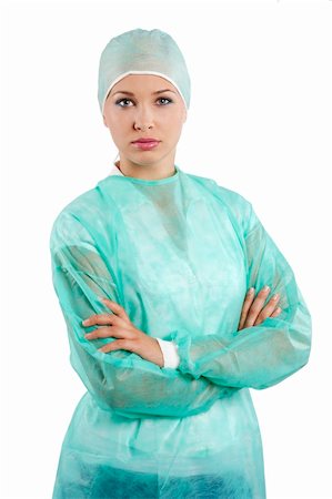 pretty young woman in green surgery dress looking in camera Stock Photo - Budget Royalty-Free & Subscription, Code: 400-04346858