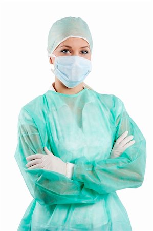 young beauty nurse in green operation dress with surgery cap and mask posing Photographie de stock - Aubaine LD & Abonnement, Code: 400-04346864
