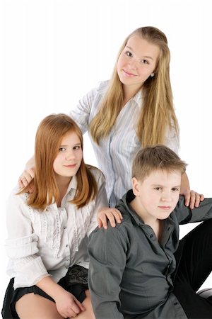 Three sitting teens Stock Photo - Budget Royalty-Free & Subscription, Code: 400-04346958