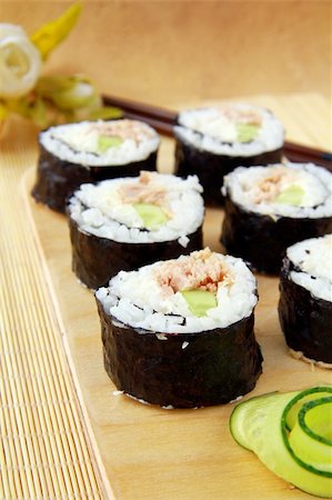 simsearch:400-07759827,k - Traditional Japanese food maki rolls on a wooden board Stock Photo - Budget Royalty-Free & Subscription, Code: 400-04347132