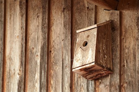 simsearch:400-06520273,k - homemade birdhouse on the wall Stock Photo - Budget Royalty-Free & Subscription, Code: 400-04347261