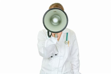 simsearch:400-04351236,k - Medical doctor woman  standing in front of camera and speaking into megaphone isolated on white Stock Photo - Budget Royalty-Free & Subscription, Code: 400-04347291