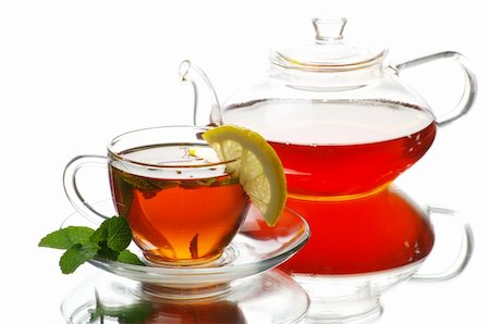 Tea being poured into glass tea cup Stock Photo - Budget Royalty-Free & Subscription, Code: 400-04347310