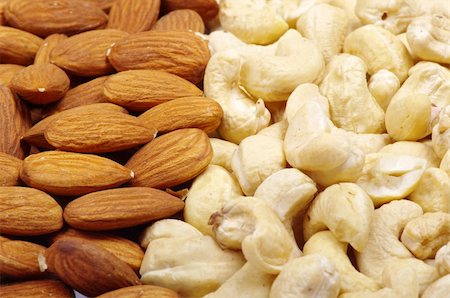 assorted nuts as a background Stock Photo - Budget Royalty-Free & Subscription, Code: 400-04347323