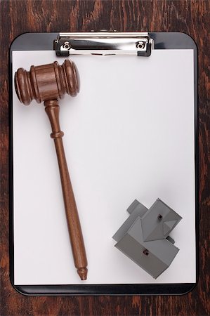 Justice gavel and house model on a clipboard. Add your text to the paper. Stock Photo - Budget Royalty-Free & Subscription, Code: 400-04347822