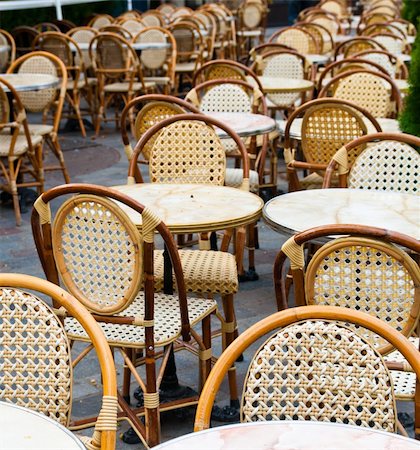 Street view of a Cafe terrace with empty tables and chairs,paris France Stock Photo - Budget Royalty-Free & Subscription, Code: 400-04348126