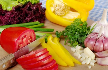 simsearch:700-03738037,k - Cutting various vegetables for a salad on wooden board Stock Photo - Budget Royalty-Free & Subscription, Code: 400-04348606