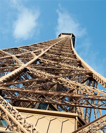 The top of the Eiffel Tower in Paris, France Foto de stock - Super Valor sin royalties y Suscripción, Código: 400-04348746