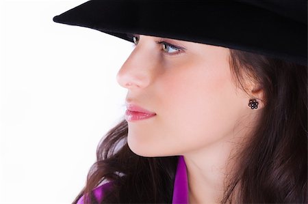 simsearch:400-04486455,k - Profile of a beautiful brunette young woman with black hat Fotografie stock - Microstock e Abbonamento, Codice: 400-04349850