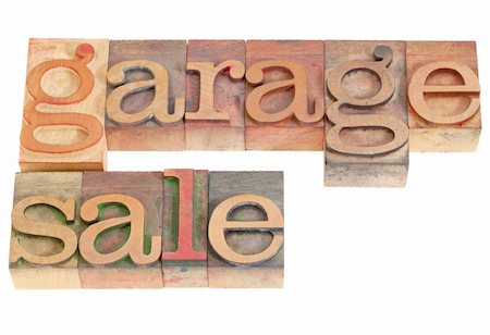 garage sale words in vintage grunge wood letterpress printing blocks, isolated on white Foto de stock - Royalty-Free Super Valor e Assinatura, Número: 400-04340212