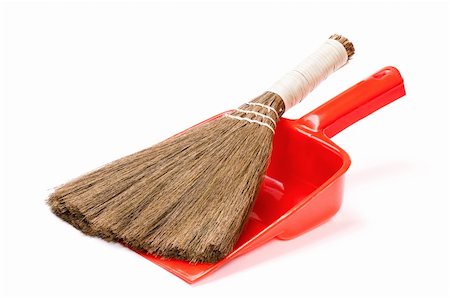 Close up of plastic red dustpan with new broom on white background. Stock Photo - Budget Royalty-Free & Subscription, Code: 400-04340431