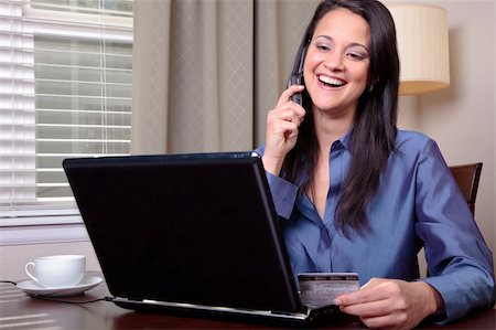 Woman on phone with customer service Stock Photo - Budget Royalty-Free & Subscription, Code: 400-04340467