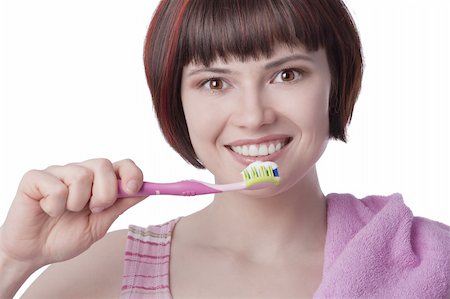 face and cleanse and one person - Woman Brushing Teeth Clean and Fresh  dental hygiene. Stock Photo - Budget Royalty-Free & Subscription, Code: 400-04340522