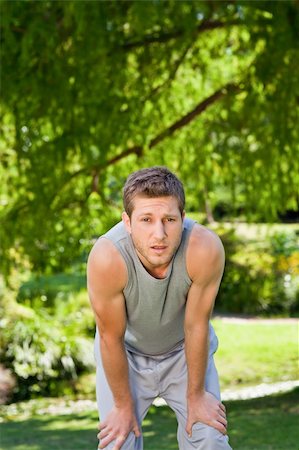 Sporty  handsome man in the park Stock Photo - Budget Royalty-Free & Subscription, Code: 400-04341050