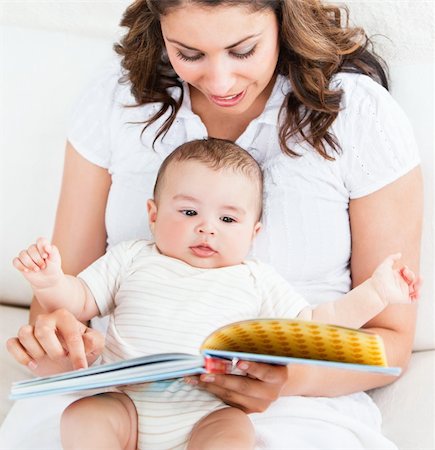 simsearch:400-05320841,k - Bright mother showing images in a book to her cute little son at home Stock Photo - Budget Royalty-Free & Subscription, Code: 400-04341606