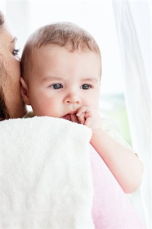 simsearch:400-04118442,k - Kind caucasian mother taking care of her adorable baby at home Stock Photo - Budget Royalty-Free & Subscription, Code: 400-04341631