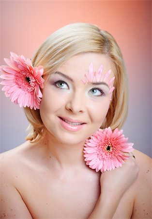 simsearch:400-04599110,k - Close-up of woman green eye. Pink flower on background. Stock Photo - Budget Royalty-Free & Subscription, Code: 400-04341899