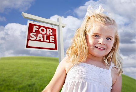 family with sold sign - Adorable Smiling Girl in Grass Field with For Sale Real Estate Sign Behind Her. Stock Photo - Budget Royalty-Free & Subscription, Code: 400-04341907