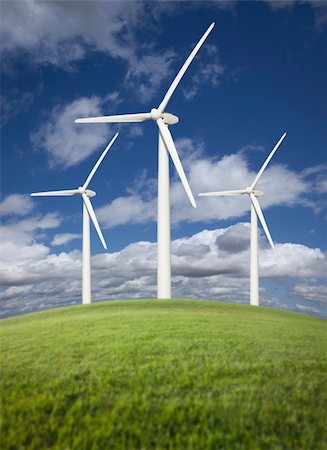 simsearch:400-07111713,k - Three Wind Turbines Over Grass Field, Dramatic Sky and Clouds. Stockbilder - Microstock & Abonnement, Bildnummer: 400-04341917