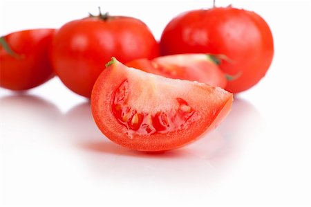 simsearch:400-05075296,k - red tomato vegetable fruits isolated on the white background Stock Photo - Budget Royalty-Free & Subscription, Code: 400-04342669