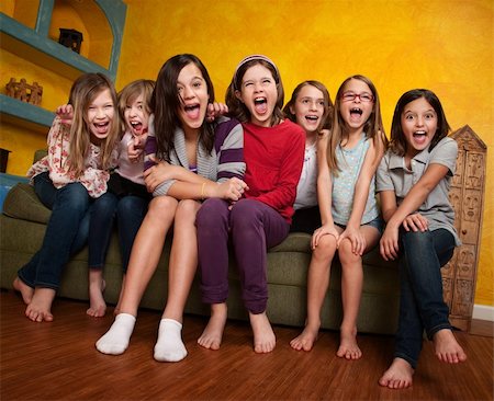 Group of happy barefoot girlfriends scream out Stock Photo - Budget Royalty-Free & Subscription, Code: 400-04342807