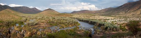 The Epupa Falls lie on the Kunene River, on the border of Angola and Namibia Stock Photo - Budget Royalty-Free & Subscription, Code: 400-04343514