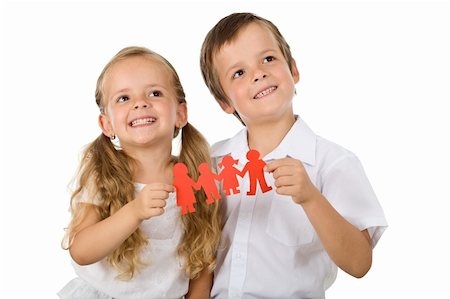 parent holding hands child silhouette - Kids holding paper people family and smiling - happy family concept Stock Photo - Budget Royalty-Free & Subscription, Code: 400-04354993