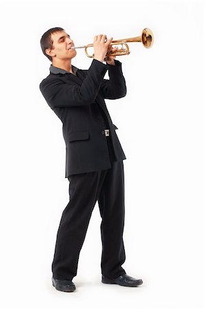 people playing brass instruments - Portrait of a young man playing his Trumpet Stock Photo - Budget Royalty-Free & Subscription, Code: 400-04355203