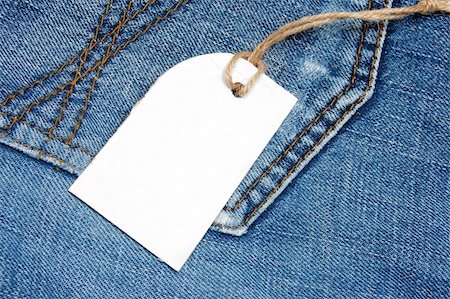 simsearch:400-04758693,k - blank price tag with copyspace on a jeans texture Photographie de stock - Aubaine LD & Abonnement, Code: 400-04355733