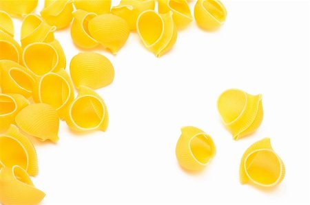 simsearch:400-05877069,k - yellow beautiful pasta on a white background Foto de stock - Super Valor sin royalties y Suscripción, Código: 400-04355819