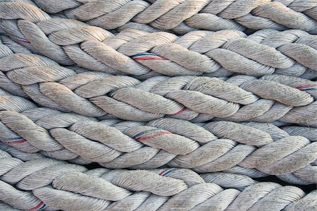 Close-up of thick textile ropes rolled on a spool Photographie de stock - Aubaine LD & Abonnement, Code: 400-04356310