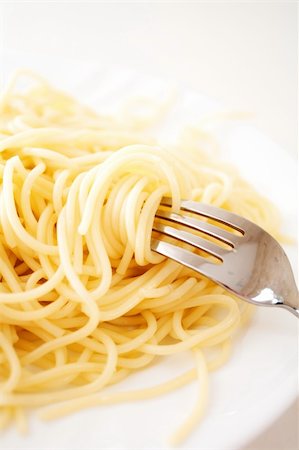 Spaghetti twirled around a fork Stock Photo - Budget Royalty-Free & Subscription, Code: 400-04357299