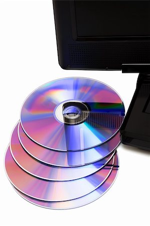 simsearch:400-04437995,k - TV with a dvd disks on a white background Photographie de stock - Aubaine LD & Abonnement, Code: 400-04357386