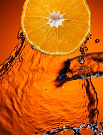 Orange with water splash Stock Photo - Budget Royalty-Free & Subscription, Code: 400-04357861