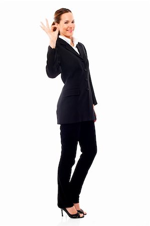 young businesswoman with her hand indicating ok on white background studio Stock Photo - Budget Royalty-Free & Subscription, Code: 400-04357938