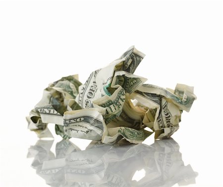 Crumpled money. Isolated over white. Stock Photo - Budget Royalty-Free & Subscription, Code: 400-04358047